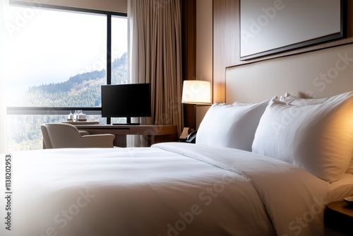 An upscale hotel room offering luxurious bedding and stunning views of nature, making it an ideal sanctuary for relaxation and rejuvenation.
