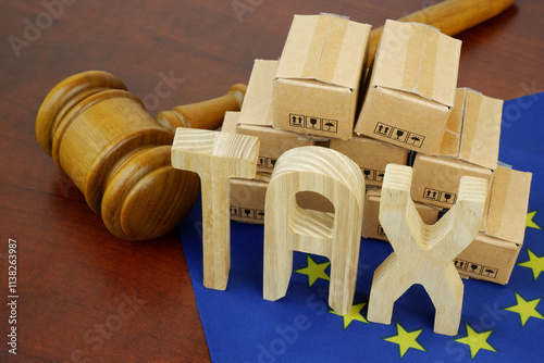 Laws and taxes in European Union concept. Judge gavel with many carton boxes and letters tax on EU flag.