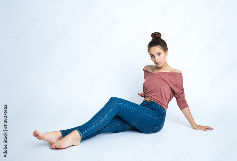 custom made wallpaper toronto digitalBeautiful young smiling woman with clean perfect fresh skin sits on the floor. Portrait of beauty model with natural make up, formed eyebrows and long eyelashes. Spa, skincare and wellness