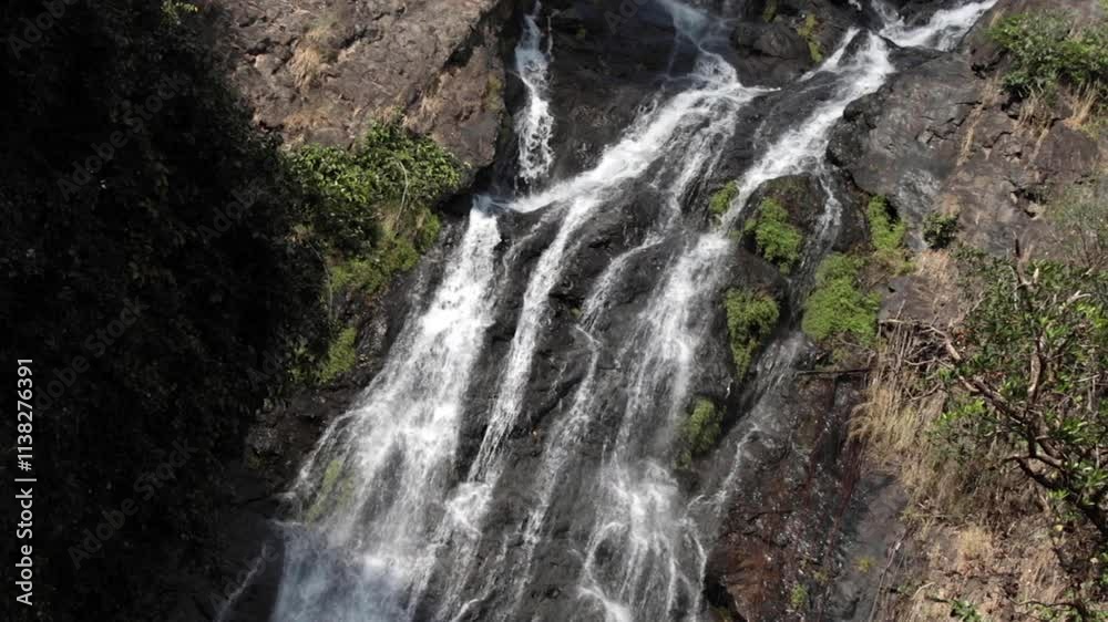 Static video waterfall stream falling down rocks and stones of mountain steep slope of Tropical forest in Sarika waterfall is the landmark national park of at Nakhon Nayok province. Static video waterfall stream falling down rocks and stones of mountain steep slope of Tropical forest in Sarika waterfall is the landmark national park of at Nakhon Nayok province.