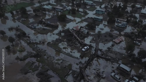 Aerial View of Cyclone Devastated Landscape: Destruction, Flooding, and Debris After the Storm
