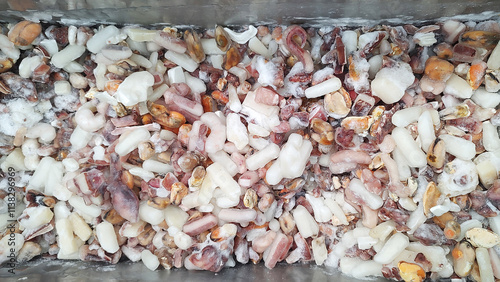 Frozen seafood cocktail in a market fridge