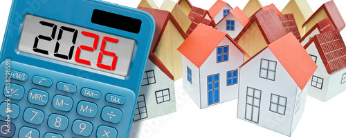 2026 REAL ESTATE PLANNING - Business concept in building activity and construction industry - New financial year and Budget 2026 concept with calculator and home models