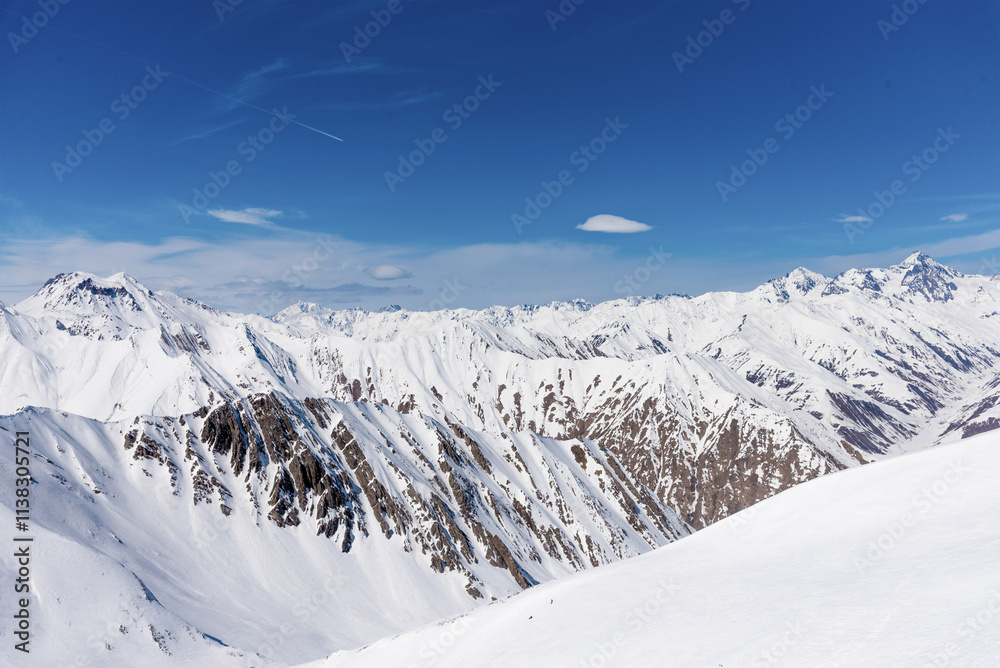 Landscape of snowy mountains, mountain range haze winter Landscape of snowy mountains, mountain range haze winter
