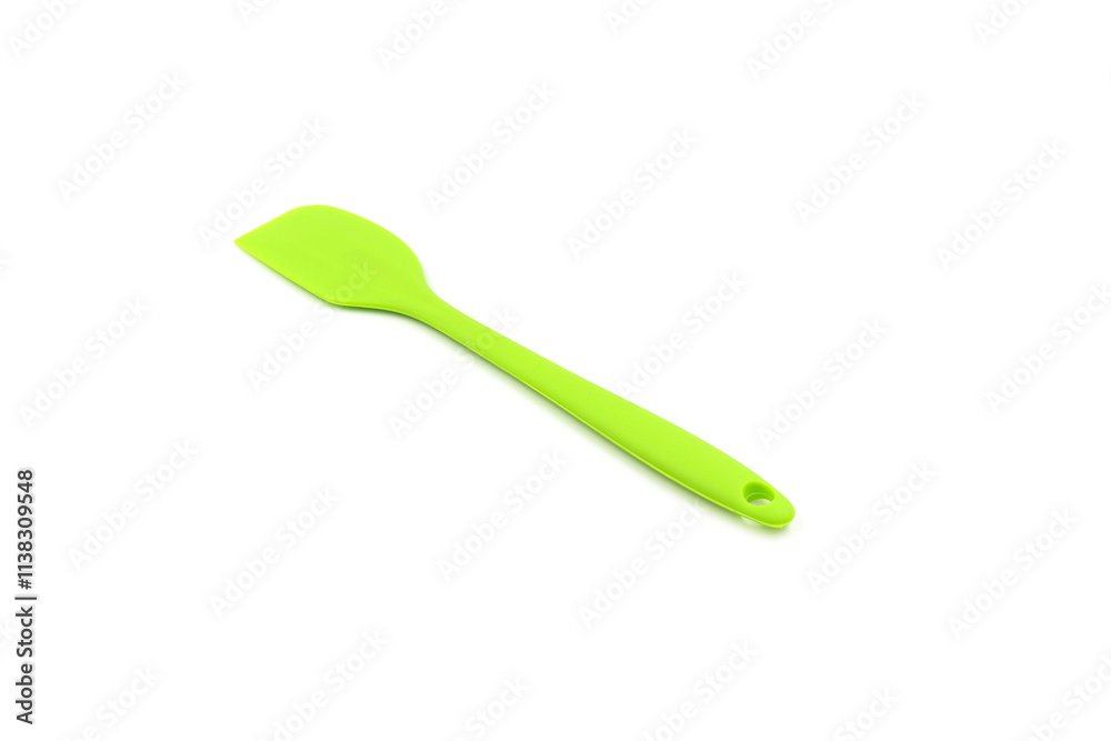 A Geen baking spatula on a white background A Geen baking spatula on a white background