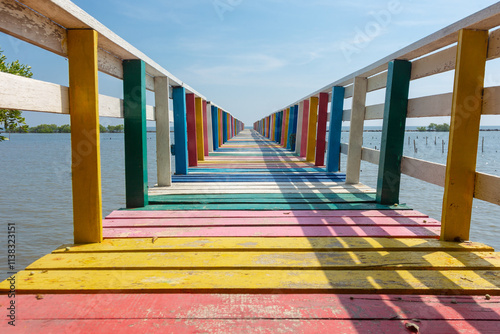 
Colorful rainbow wooden bridge, a coastal community near Wat Kaew Mongkol and Ban Chay Talay Kalong School, Samut Sakhon photo