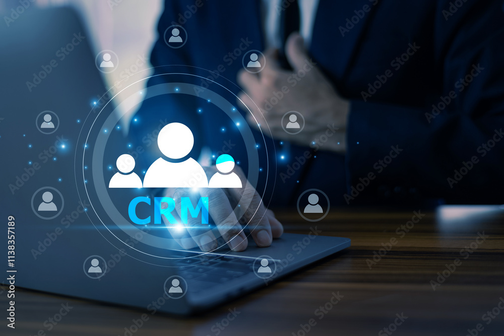 A businessman uses CRM (Customer Relationship Management) tools to streamline communication, enhance customer satisfaction, and build long-term relationships, ultimately driving business growth.