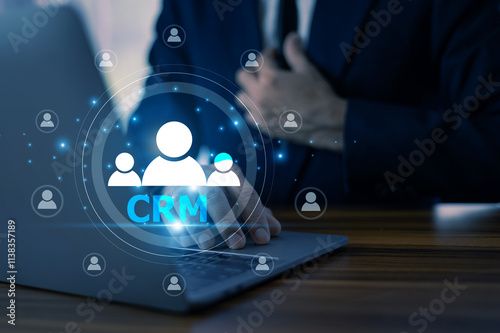 Obraz na płótnie A businessman uses CRM (Customer Relationship Management) tools to streamline communication, enhance customer satisfaction, and build long-term relationships, ultimately driving business growth. w salonie