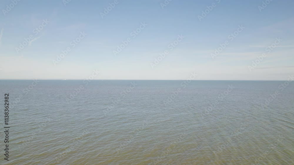 Drone view over the sea of Dunster Beach, on a sunny day with clear, blue sky in Somerset, UK Drone view over the sea of Dunster Beach, on a sunny day with clear, blue sky in Somerset, UK