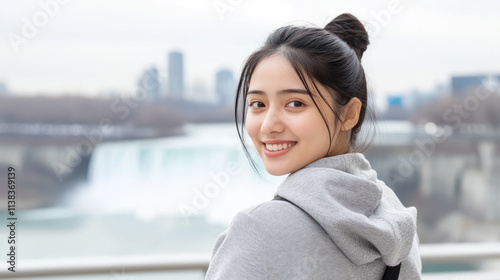 Indonesian tourist woman traveling and enjoying vacation at Niagara Falls Free Download Indonesian tourist woman traveling and enjoying vacation at Niagara Falls - GFXLoad