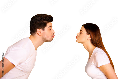 Close up side profile photo amazing beautiful she her he him his guy lady bonding ahead each other need kisses tenderness spread lips wear casual white t-shirts outfit isolated yellow background photo