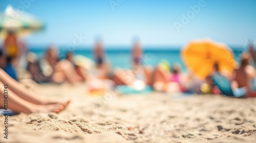 Blurred beach scene with people relaxing under umbrellas showcasing a vibrant summer atmosphere and sandy shoreline in the background