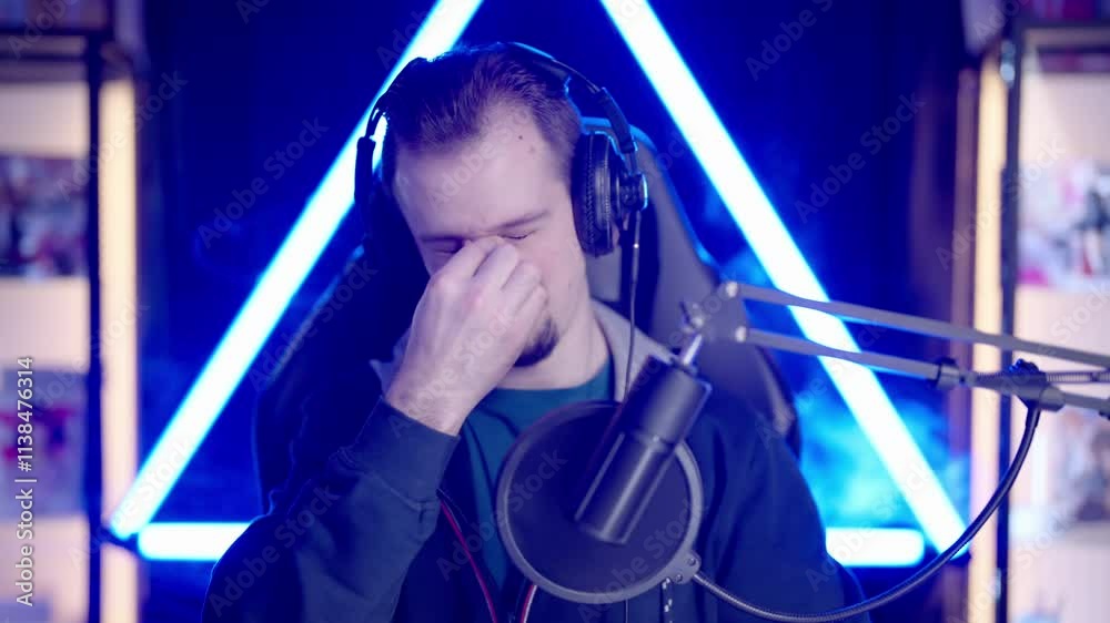 Male gaming streamer getting eye fatigue with pain after long game session 4K