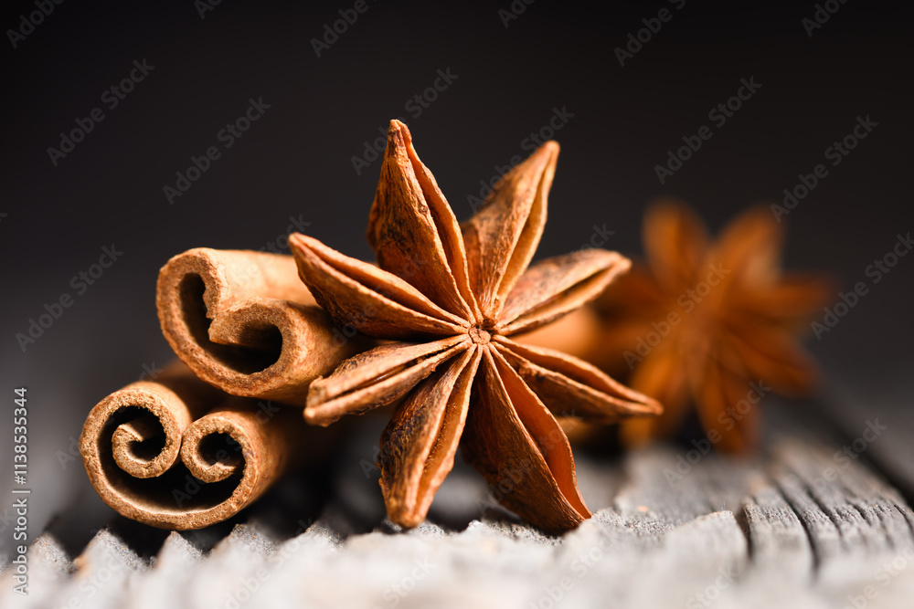 Star anise and cinnamon sticks close up. Macro shot on black background. Food photography Star anise and cinnamon sticks close up. Macro shot on black background. Food photography