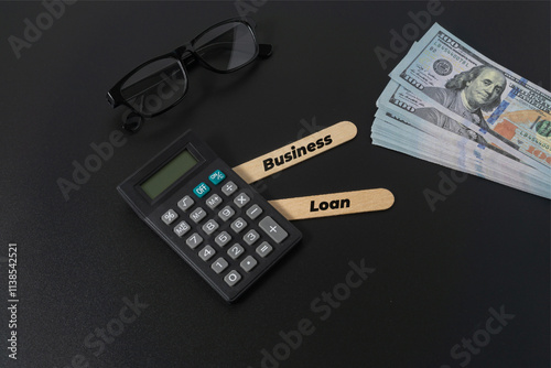 Business concept with a text Business Plan on black background