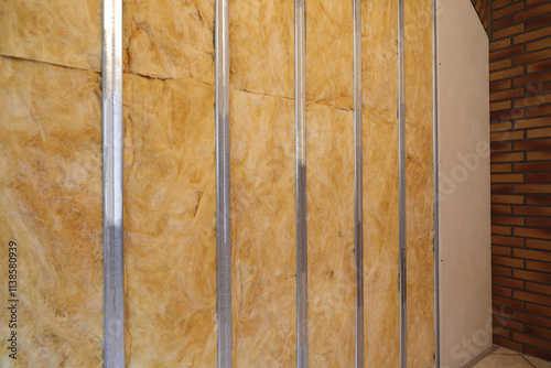 a new drywall with insulation and metal studs