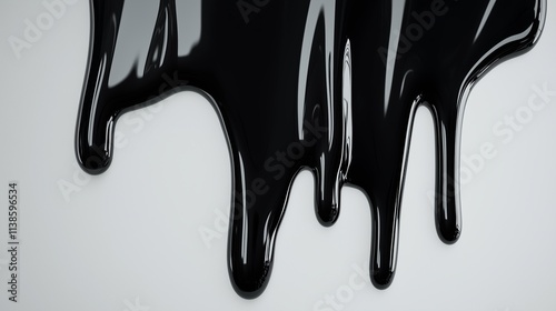 Black dripping liquid against a white solid background. photo