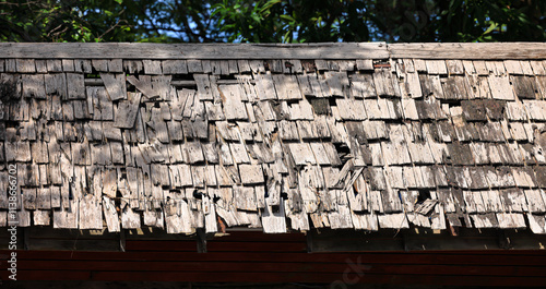 molder wood shingle roof, old cedar roofing season weather protection. 