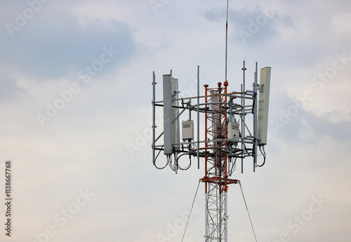 Wireless Communication Antenna pole, Mobile phone mast antenna pole on top of dilapidated building