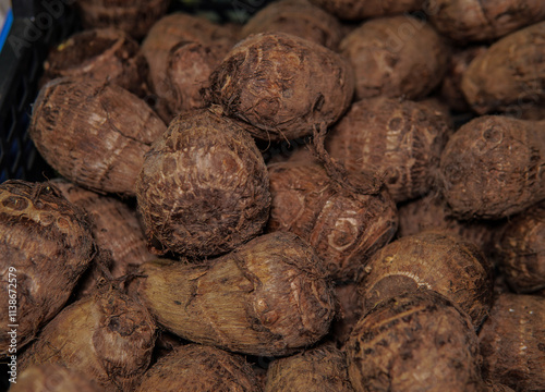 Close-up of fresh yams. The photo is perfect for content about healthy eating, root vegetables, or culinary inspiration in traditional and modern cuisine. photo