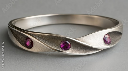 Elegant Silver Bracelet with Pink Gemstones in Modern Design photo