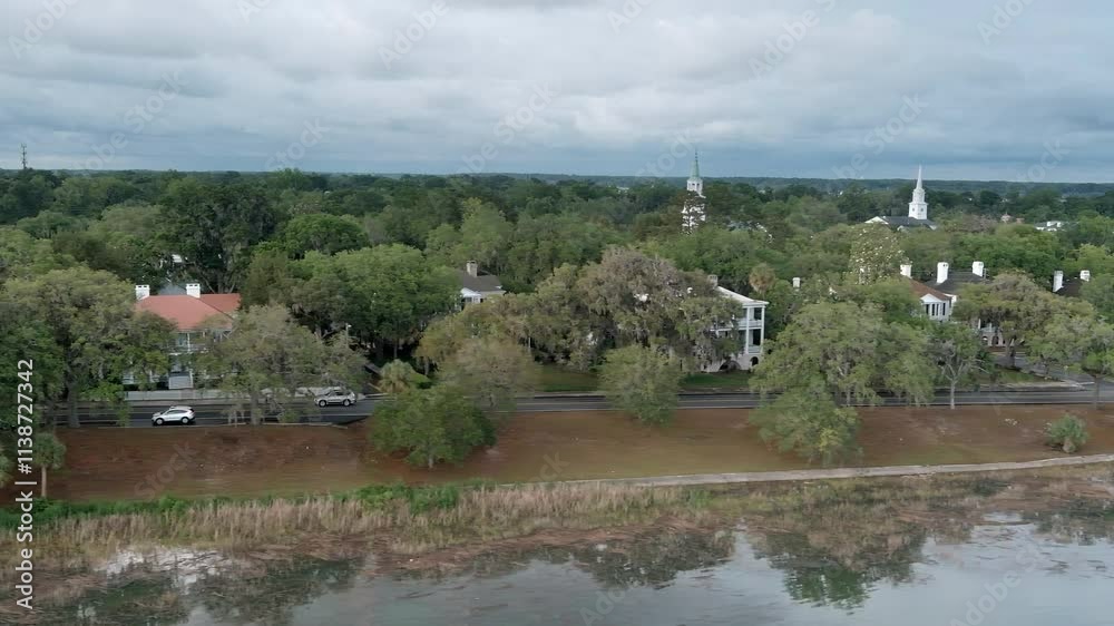 Low angle aerial view moving across the waterfront of the historic district in Beaufort, South Carolina. Low angle aerial view moving across the waterfront of the historic district in Beaufort, South Carolina.