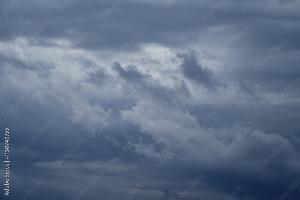 Winter sky with light and shadow playing on gray clouds. Winter sky with light and shadow playing on gray clouds.