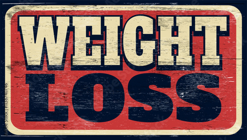 Aged retro weight loss sign on wood
