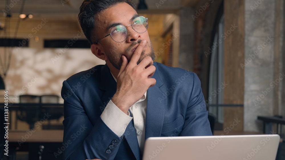 © Yuliia - Thoughtful puzzled businessman Arabian Indian man thinking male guy employer worker think idea business plan strategy ponder consider doubt choose remember decide search deep thought question indoors © Yuliia - Thoughtful puzzled businessman Arabian Indian man thinking male guy employer worker think idea business plan strategy ponder consider doubt choose remember decide search deep thought question indoors