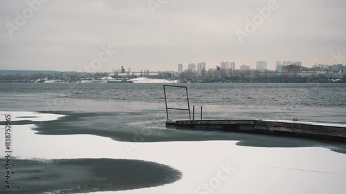 Wallpaper Mural Frozen river in nature.
Winter nature landscape.
River bank in winter.
Ice on the water.
Freezing river.
The lake is covered with ice in winter.
Cold water in the river.
Winter beauty.
Forest in winte Torontodigital.ca