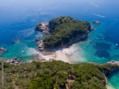 Aerial drone view of Limni Beach Glyko, on the island of Corfu. Greece. Where the two beaches are connected to the mainland providing a wonderful scenery. Unique double beach. Kerkyra photo