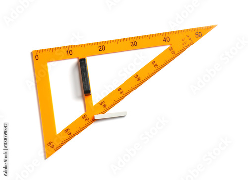 Triangle ruler and chalk isolated on white, top view photo