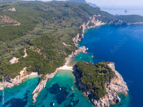 Aerial drone view of Limni Beach Glyko, on the island of Corfu. Greece. Where the two beaches are connected to the mainland providing a wonderful scenery. Unique double beach. Kerkyra photo