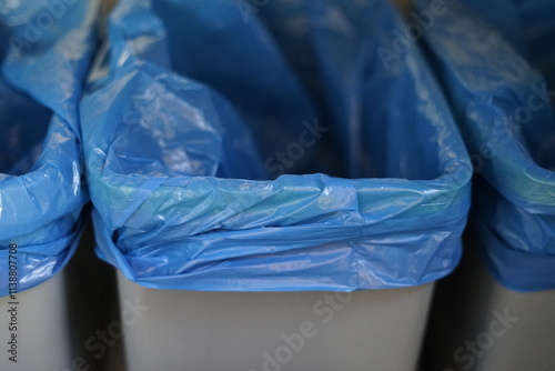 three trash garbage bins can lid blue bags eco recycle sorted bio planet waste photo