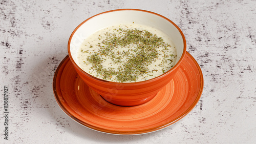 Azerbaijani yogurt soup bowl - Dovga photo