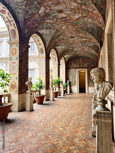 Картината върху платно View of a frescoed corridor in Palazzo Altemps, adorned with marble busts and terracotta flooring