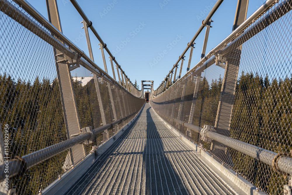 Sky Bridge 721, Lower Moravia, Czech Republic - December 1, 2024: The longest pedestrian suspension bridge in the world. Mountain resort Dolni Morava Sky Bridge 721, Lower Moravia, Czech Republic - December 1, 2024: The longest pedestrian suspension bridge in the world. Mountain resort Dolni Morava