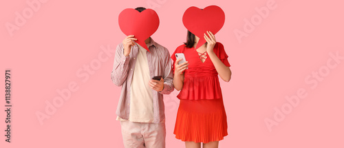 Young couple with mobile ph...