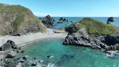 Flying over secluded beaches and rocky coves on the Oregon coastline.