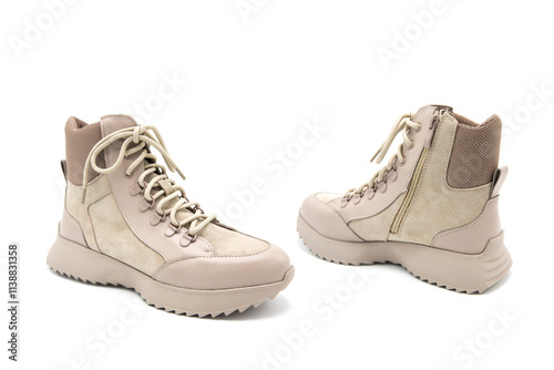 Fashionable leather lace-up boots isolated on white background. View from all sides. High insulated sneakers.	 photo