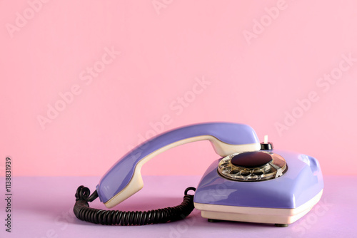 Lilac retro telephone on co...