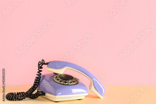 Lilac retro telephone on co...
