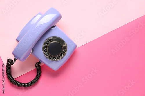 Lilac retro telephone on pi...