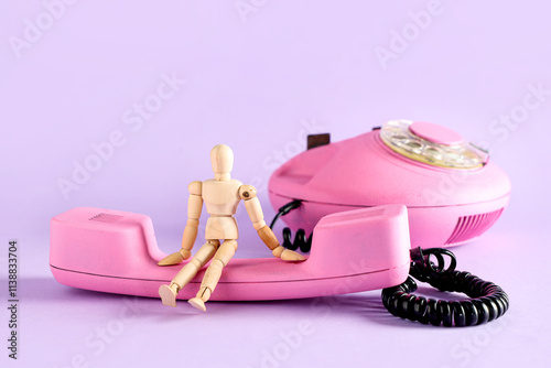 Pink retro telephone with h...