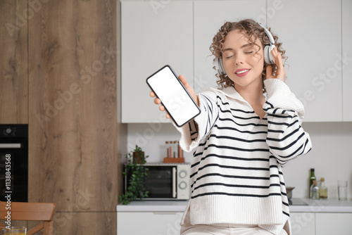 Young woman with headphones...