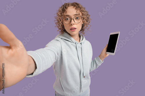 Young woman with tablet com...