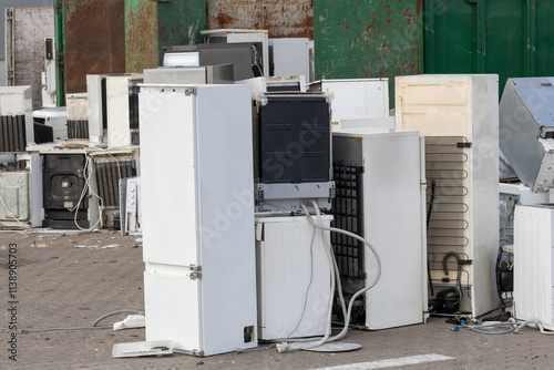 Discarded Refrigerators and Washing Machines at Junkyard