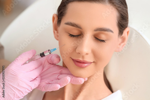 Young girl receiving filler...
