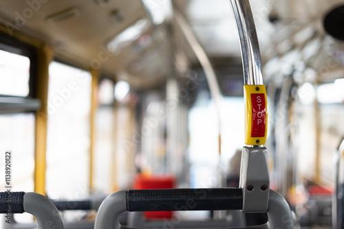 Interior of public transport bus with emphasis on the stop button.Lisbon-Portugal.