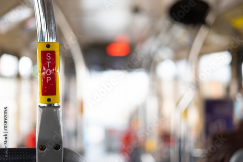 Interior of public transport bus with emphasis on the stop button.Lisbon-Portugal.